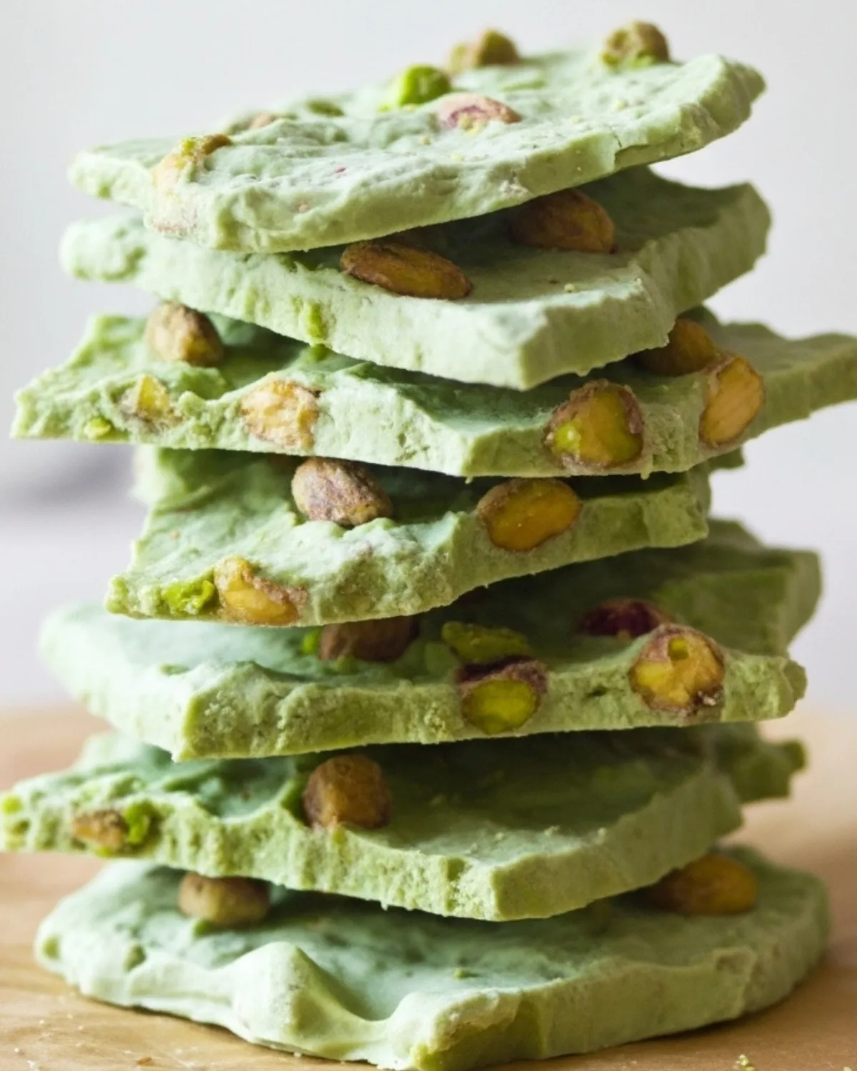 Stack of pistachio-studded matcha yogurt bark shards