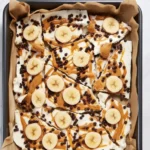 ingredients for frozen yogurt bark: Greek yogurt, peanut butter, banana, chocolate, chia, hemp