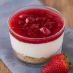 Pouring yogurt cheesecake filling over oat crust in small cups