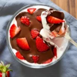 Easy Strawberry Yogurt Cups (Sweet & Healthy) 2 Spoon dipping into strawberry yogurt cup