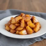 individual apple crisp cups on cooling rack ready to serve