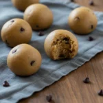 Protein Cookie Dough Bites (Healthy and No Bake) 2 Close up bite revealing creamy interior of protein cookie dough bite