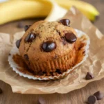 Inside of banana bread muffin showing moist crumb