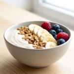 Healthy Banana Oat Breakfast Smoothie Bowl 2 Close up of creamy banana oat smoothie bowl