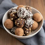 3 Ingredient Chocolate Date Truffles 2 fudgy chocolate date truffle bitten open