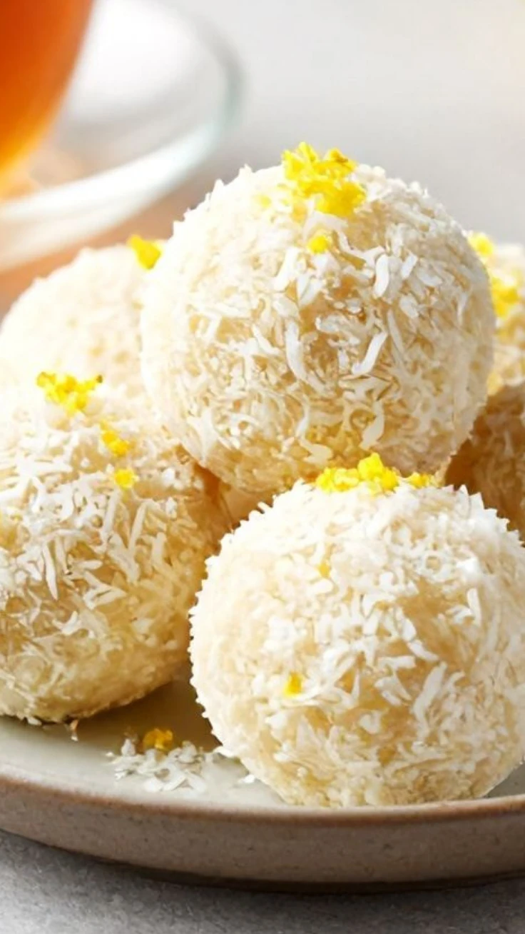 No Bake Lemon Coconut Bliss Balls Lemon coconut bliss balls with fresh lemon slices