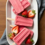 creamy strawberry yogurt popsicle close up